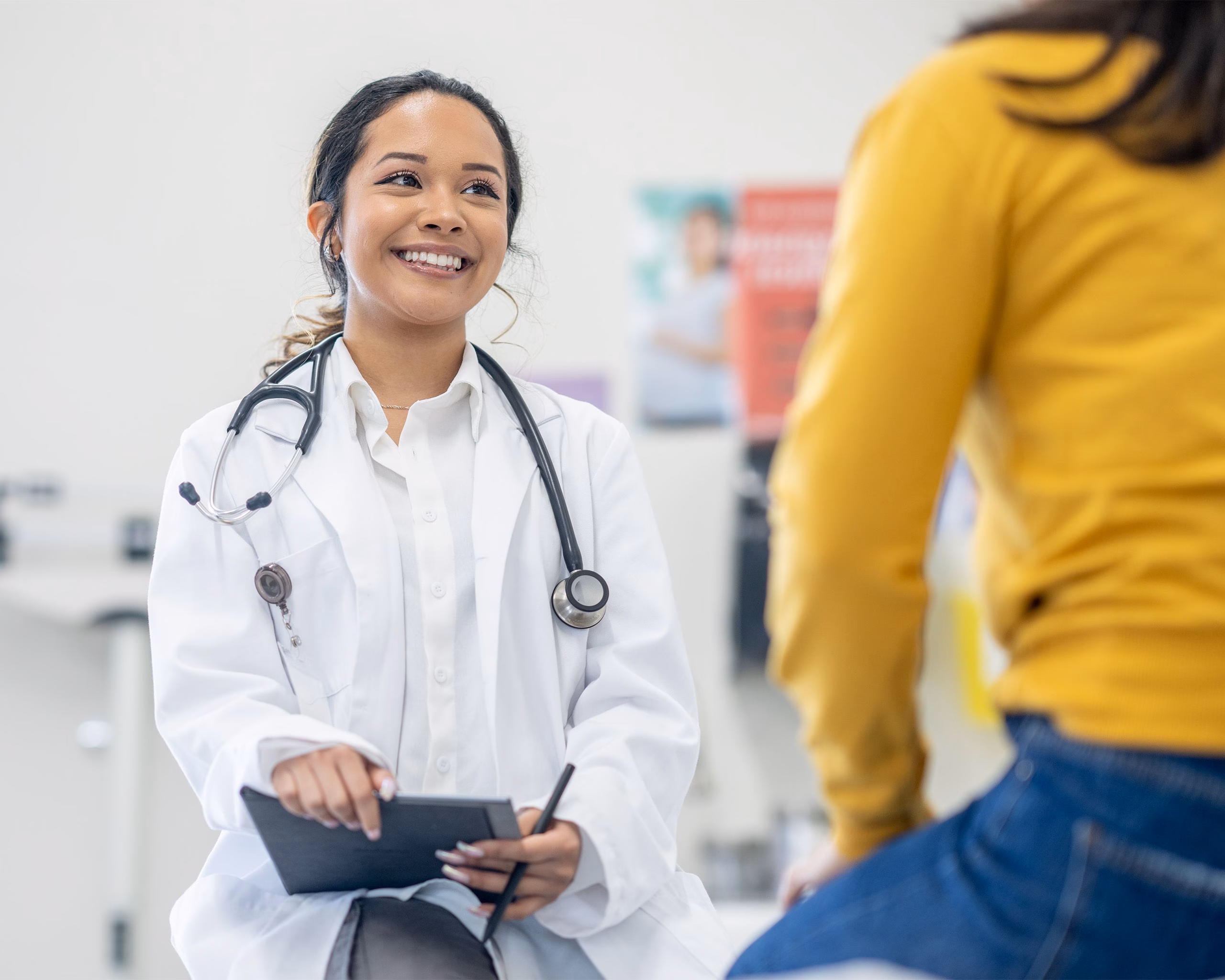 Woman Doctor Talking With Patient